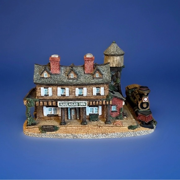Vintage Railhead Inn by Maurice Wideman statue
